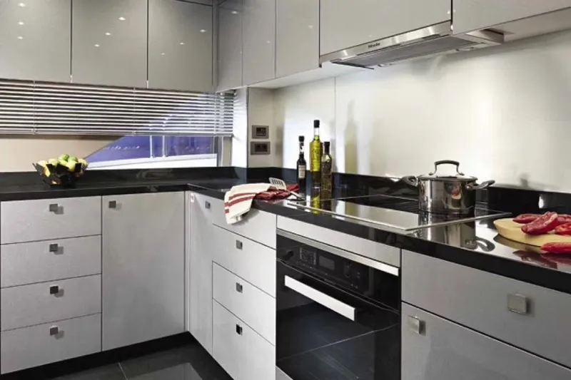  Yacht Photos Pics Modern kitchen in 2018 Sunseeker 95 Yacht with sleek cabinetry and stainless steel appliances.