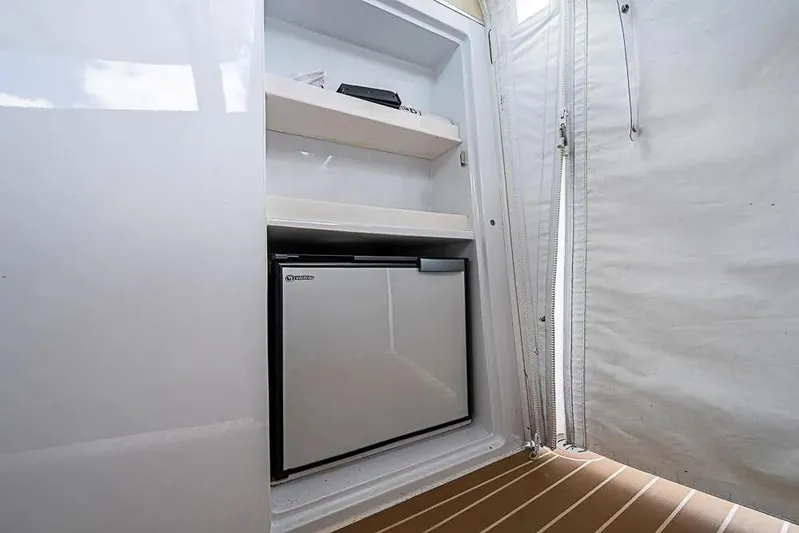 Gazelle Yacht Photos Pics Compact fridge and shelves inside a 2014 Zeelander Z44 yacht.