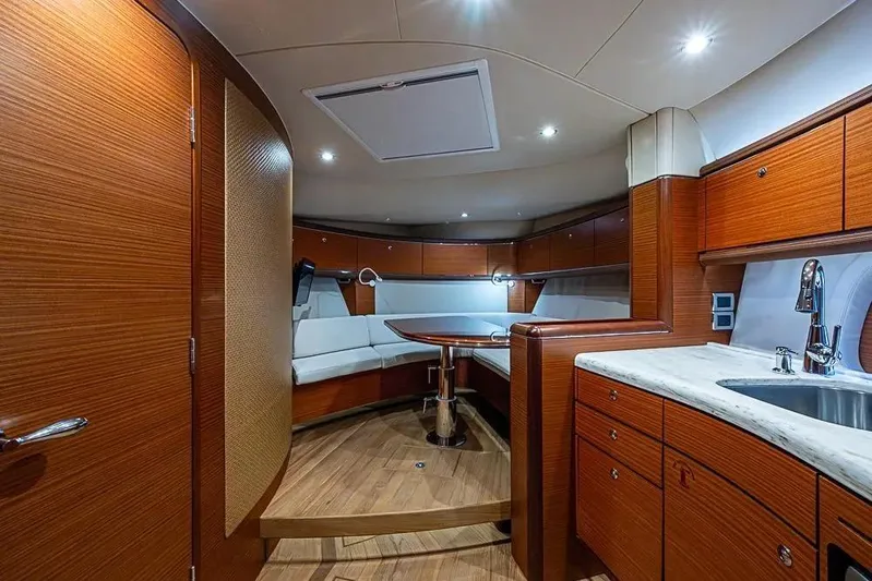Gazelle Yacht Photos Pics Luxurious interior of 2014 Zeelander Z44 yacht with wood finish and modern amenities.