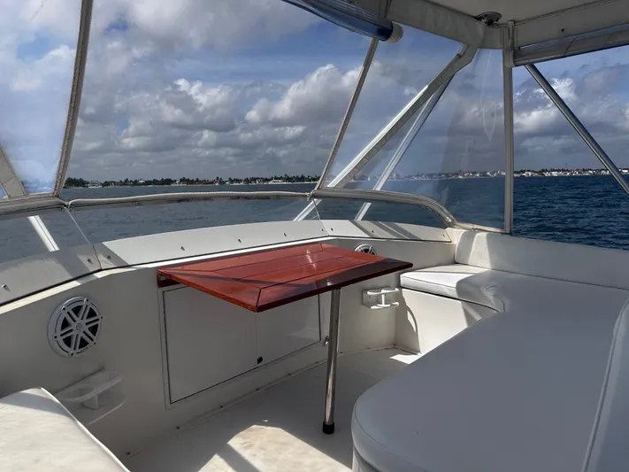 Calypso Yacht Photos Pics Interior view of 1996 Viking 47 Convertible yacht with ocean backdrop.