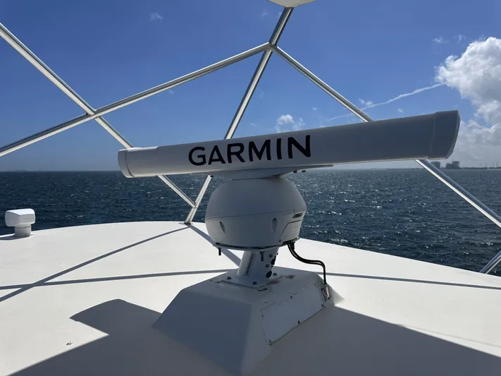Calypso Yacht Photos Pics Garmin radar on 1996 Viking 47 Convertible yacht against ocean backdrop.