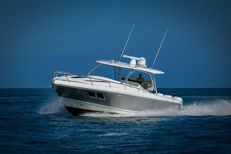  Yacht Photos Pics 2020 Intrepid 407 Cuddy cruising on open water.