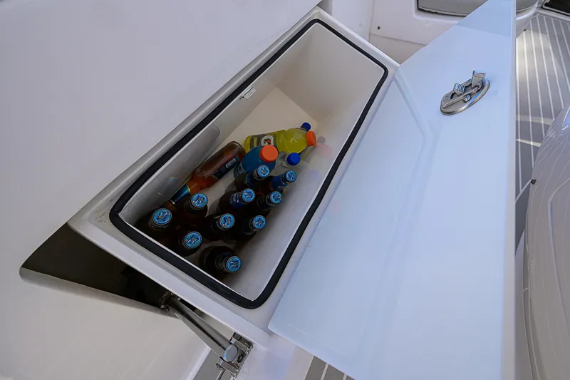  Yacht Photos Pics Intrepid 407 Cuddy 2020 boat cooler with assorted drinks inside.