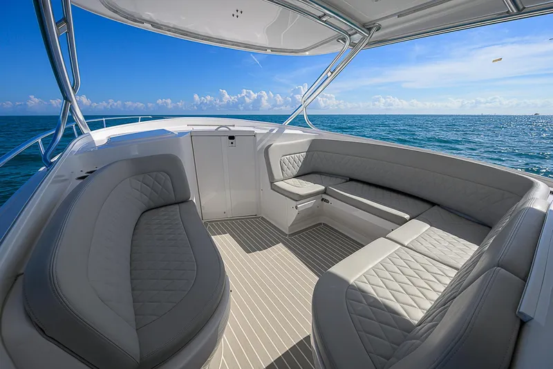  Yacht Photos Pics Luxurious 2020 Intrepid 407 Cuddy boat interior with ocean view.