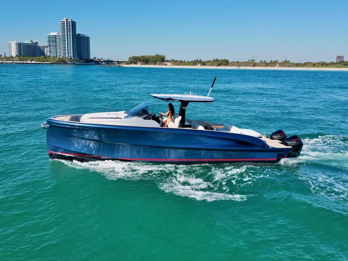 40f Open O/b Yacht Photos Pics 2024 Solaris Power SP 40F Open yacht cruising in clear blue waters.