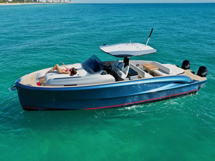 40f Open O/b Yacht Photos Pics 2024 Solaris Power SP 40F Open yacht cruising on clear blue waters.