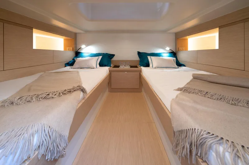 40f Open O/b Yacht Photos Pics Luxurious 2024 Solaris Power SP 40F open cabin with twin beds and elegant decor.