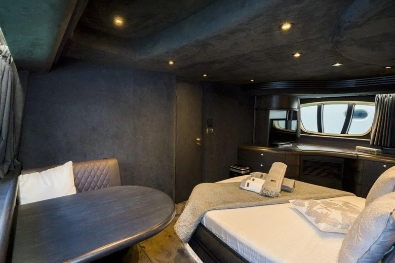  Yacht Photos Pics Luxurious interior of a 2005 Azimut 68 yacht with elegant furnishings and ambient lighting.