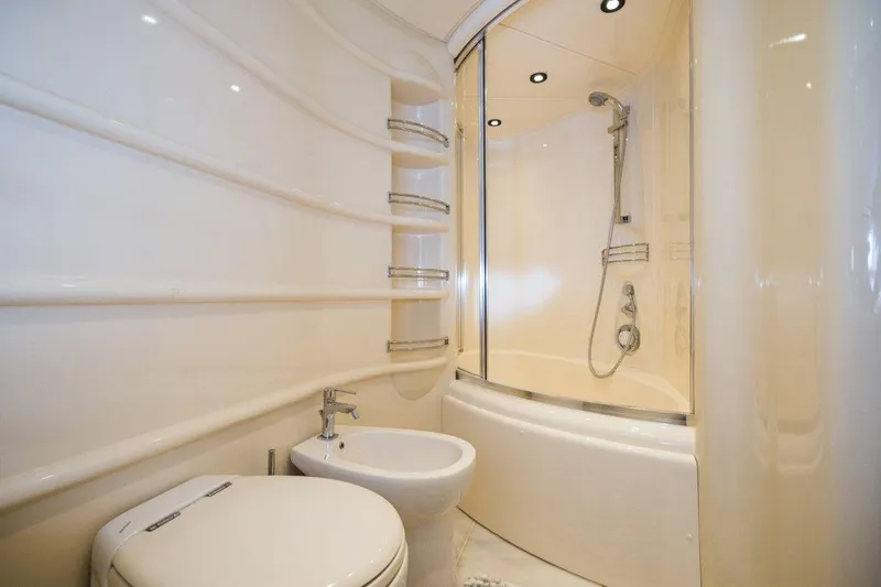  Yacht Photos Pics Luxurious bathroom in 2005 Azimut 68 yacht with modern shower and fixtures.