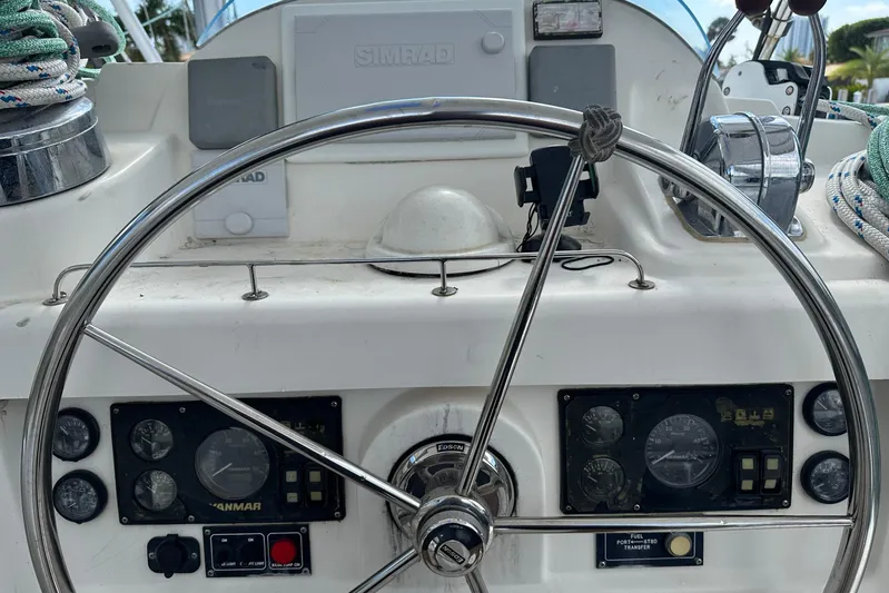  Yacht Photos Pics Steering wheel and controls of a 2011 Robertson & Caine Leopard 46 yacht.