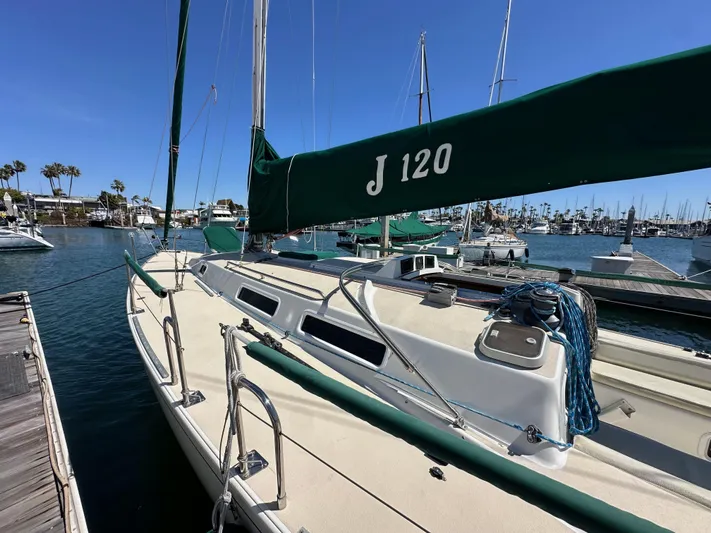 Ma Jolie Yacht Photos Pics 1996 J Boats J/120 sailboat docked in a sunny marina.