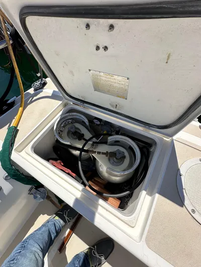 Ma Jolie Yacht Photos Pics Open storage compartment on 1996 J Boats J/120 sailboat deck.