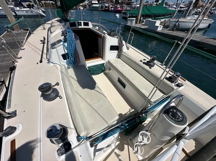 Ma Jolie Yacht Photos Pics 1996 J Boats J/120 sailboat cockpit with winches and seating, docked at marina.