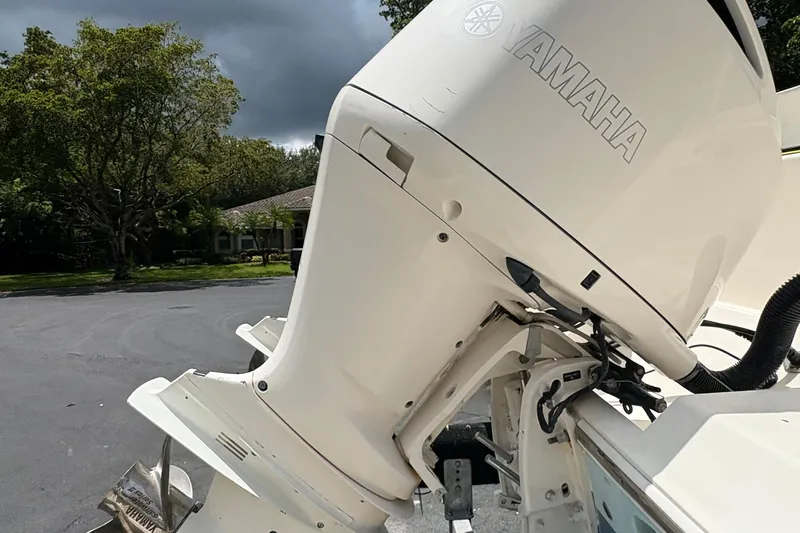 Joe Yacht Photos Pics 2018 Cobia 301 Center Console with Yamaha outboard motor in a scenic outdoor setting.