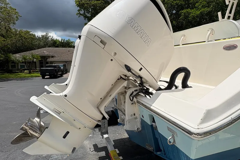 Joe Yacht Photos Pics 2018 Cobia 301 Center Console with Yamaha outboard motor, parked outdoors.