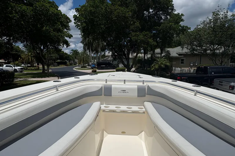 Joe Yacht Photos Pics 2018 Cobia 301 Center Console boat with spacious seating and sleek design.