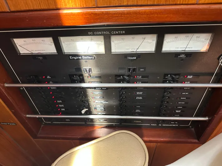 Unexpected Pleasure Yacht Photos Pics DC control center panel on a 1985 Nautical Development 56 yacht.