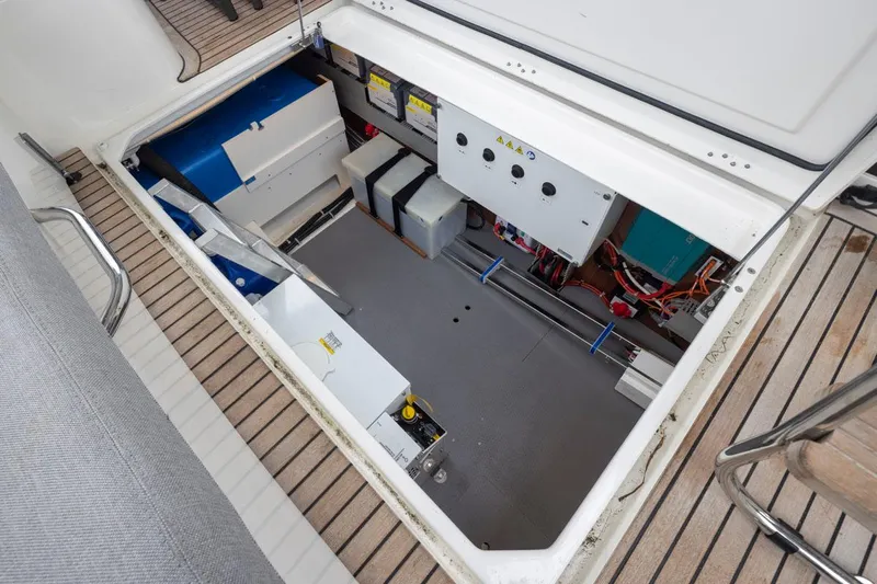 4 My Valentine Yacht Photos Pics Engine compartment of 2022 Beneteau Swift Trawler 41, showcasing electrical systems and components.