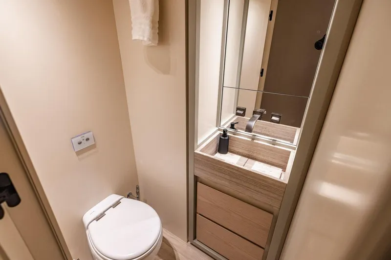 Legacy Yacht Photos Pics Luxurious bathroom in 2022 Sanlorenzo SD96 yacht, featuring modern fixtures and elegant design.