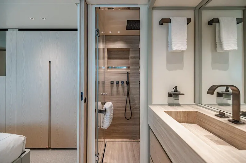 Legacy Yacht Photos Pics Luxurious bathroom interior of 2022 Sanlorenzo SD96 yacht, featuring modern design and elegant fixtures.
