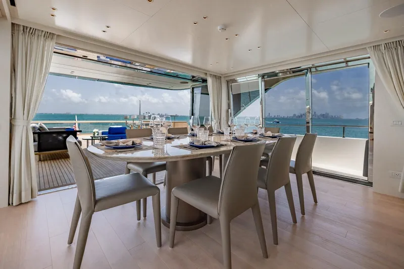 Legacy Yacht Photos Pics Luxurious dining area on 2022 Sanlorenzo SD96 yacht with ocean view.