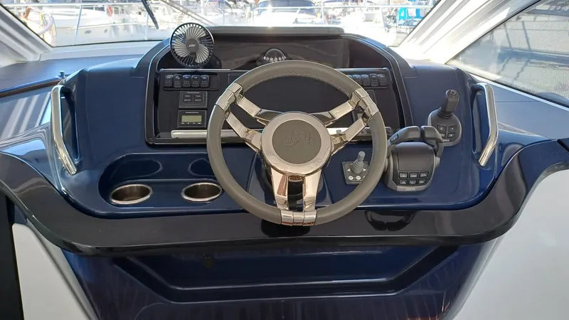  Yacht Photos Pics Cockpit of 2023 Beneteau Gran Turismo 41 with modern steering and controls.