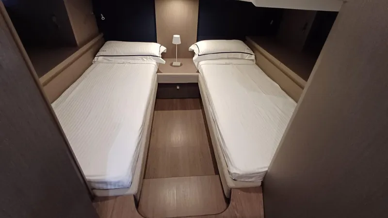  Yacht Photos Pics 2023 Beneteau Gran Turismo 41 cabin with twin beds and modern decor.