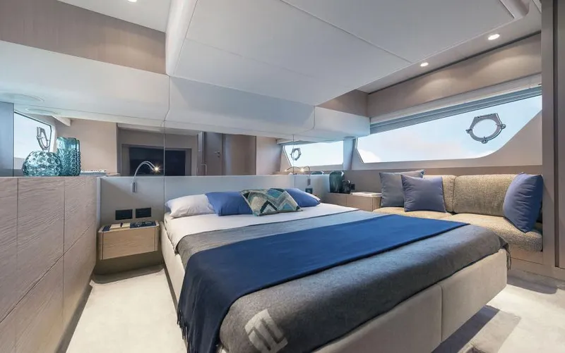  Yacht Photos Pics Luxurious bedroom interior of 2025 Ferretti Yachts 500, featuring modern design and elegant decor.