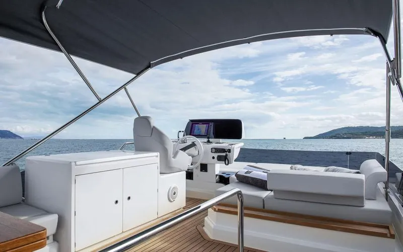  Yacht Photos Pics Luxurious 2025 Ferretti Yachts 500 interior with ocean view and modern helm station.