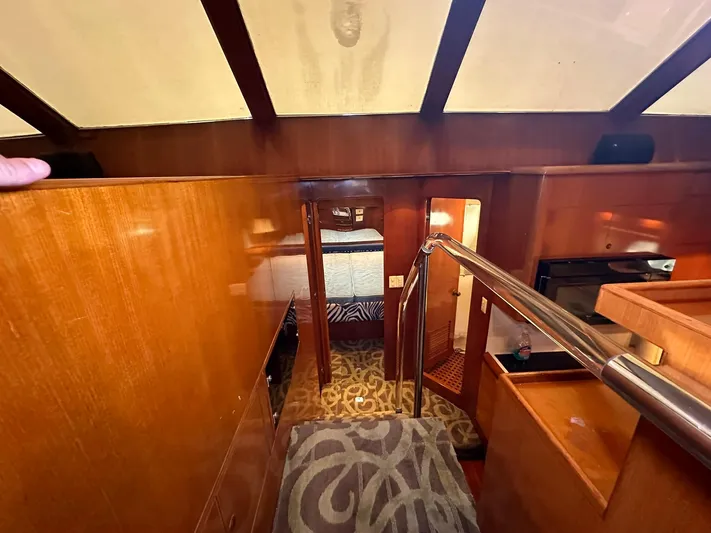 Daddy's Ju-al Yacht Photos Pics Interior of 1996 President 655 Flybridge Cockpit MY yacht with wooden finishes.