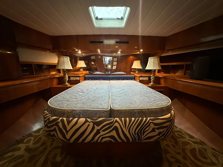 Daddy's Ju-al Yacht Photos Pics Luxurious bedroom interior of 1996 President 655 Flybridge Cockpit MY yacht.