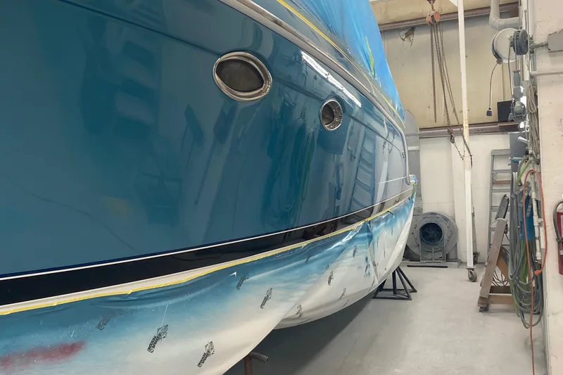  Yacht Photos Pics 2012 Formula 31PC boat in a workshop, undergoing maintenance or repair.