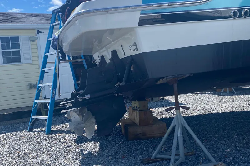  Yacht Photos Pics 2012 Formula 31PC boat on stands, with ladder and house in background.