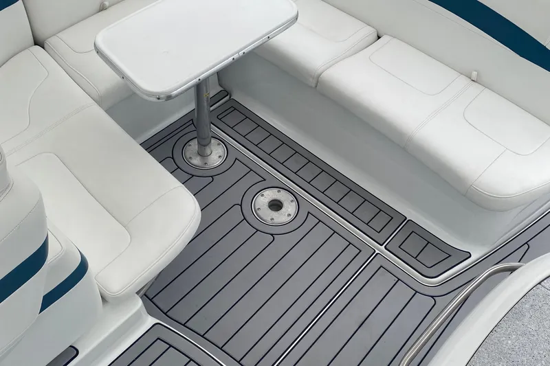  Yacht Photos Pics 2012 Formula 31PC boat interior with white seating and sleek flooring.