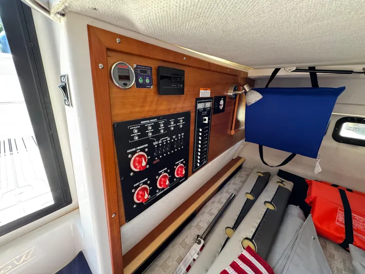 Yacht Photos Pics 2024 Cutwater C-288 Coupe interior with control panel and storage area.