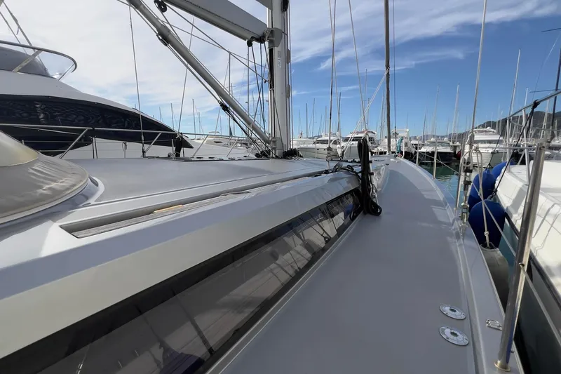  Yacht Photos Pics 2017 Grand Soleil 52 LC yacht deck view in marina, surrounded by other boats.