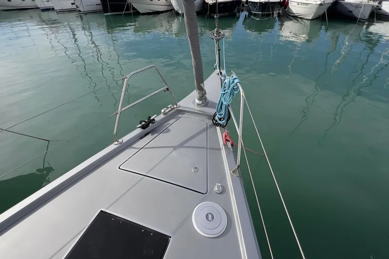  Yacht Photos Pics Bow of 2017 Grand Soleil 52 LC yacht docked in marina.