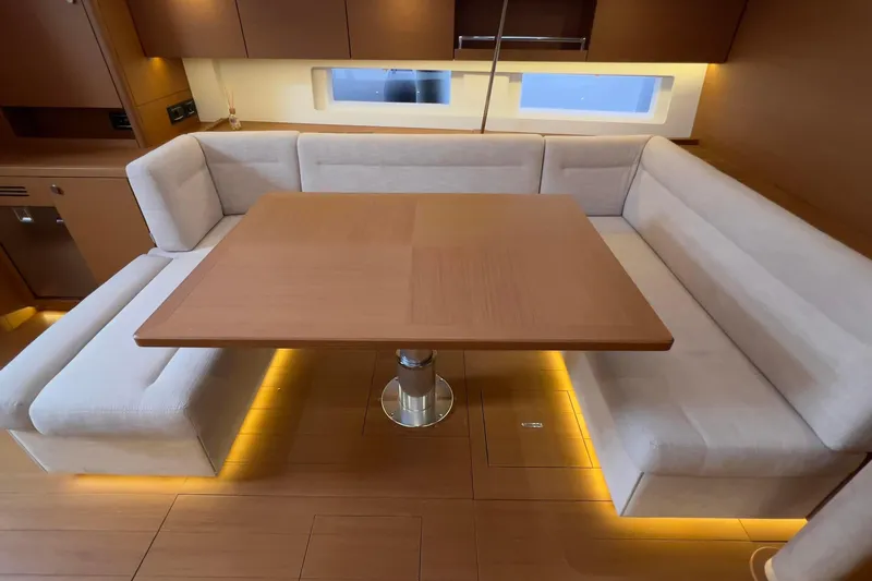  Yacht Photos Pics Luxurious interior of 2017 Grand Soleil 52 LC yacht with elegant dining area.