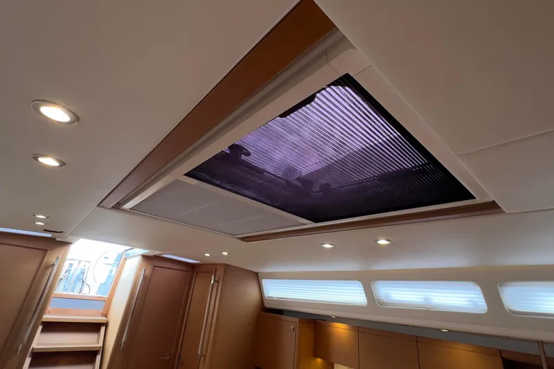  Yacht Photos Pics Interior view of 2017 Grand Soleil 52 LC yacht with modern ceiling design.