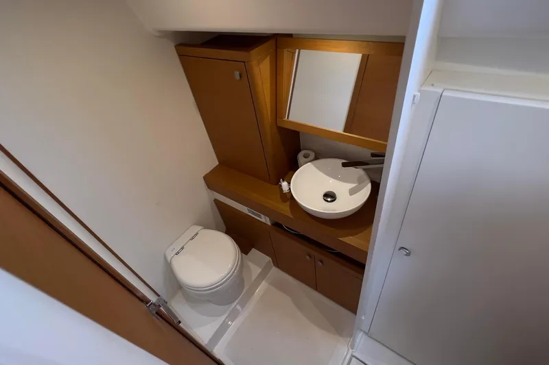  Yacht Photos Pics Modern bathroom in 2017 Grand Soleil 52 LC yacht with sink and toilet.
