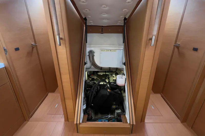  Yacht Photos Pics Engine room of 2017 Grand Soleil 52 LC yacht with wooden interior.