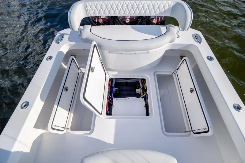  Yacht Photos Pics Open storage compartments on a 2018 Tribute 37 boat deck.