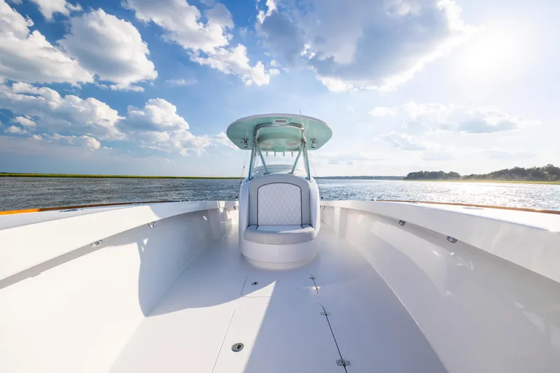  Yacht Photos Pics 2018 Tribute 37 boat on open water under a bright, cloudy sky.