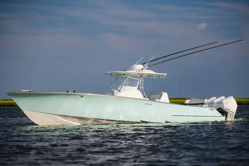  Yacht Photos Pics 2018 Tribute 37 boat on water with clear sky background.
