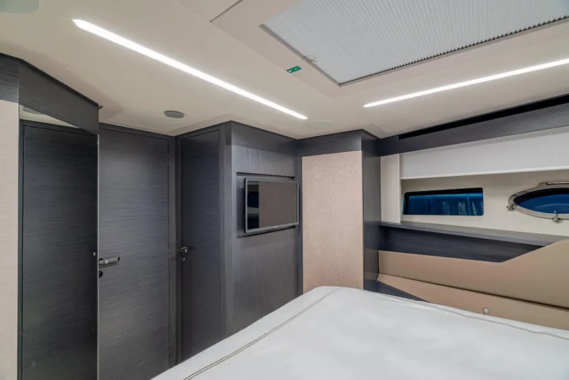 Silver Bullet Yacht Photos Pics Luxurious interior of 2022 Pershing 8X yacht cabin with modern design and sleek finishes.