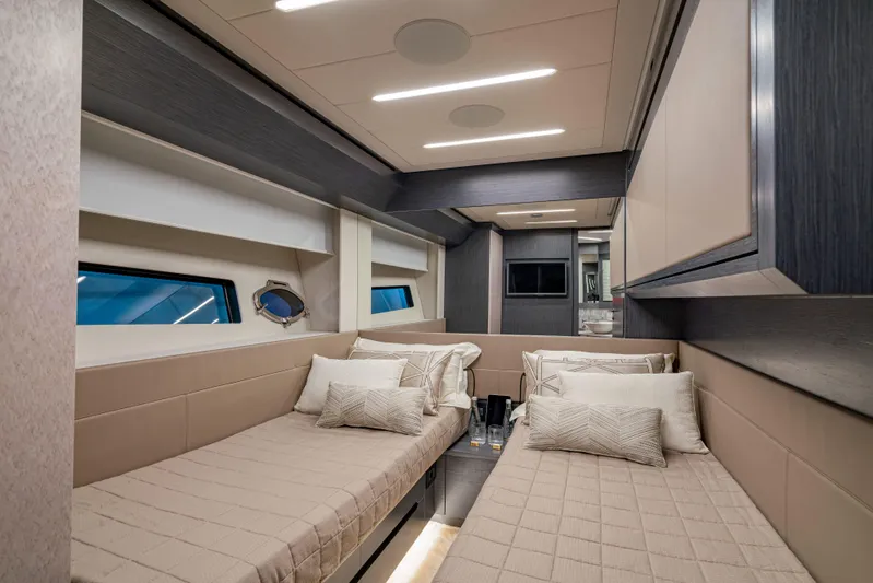 Silver Bullet Yacht Photos Pics Luxurious interior of 2022 Pershing 8X yacht with twin beds and modern design.