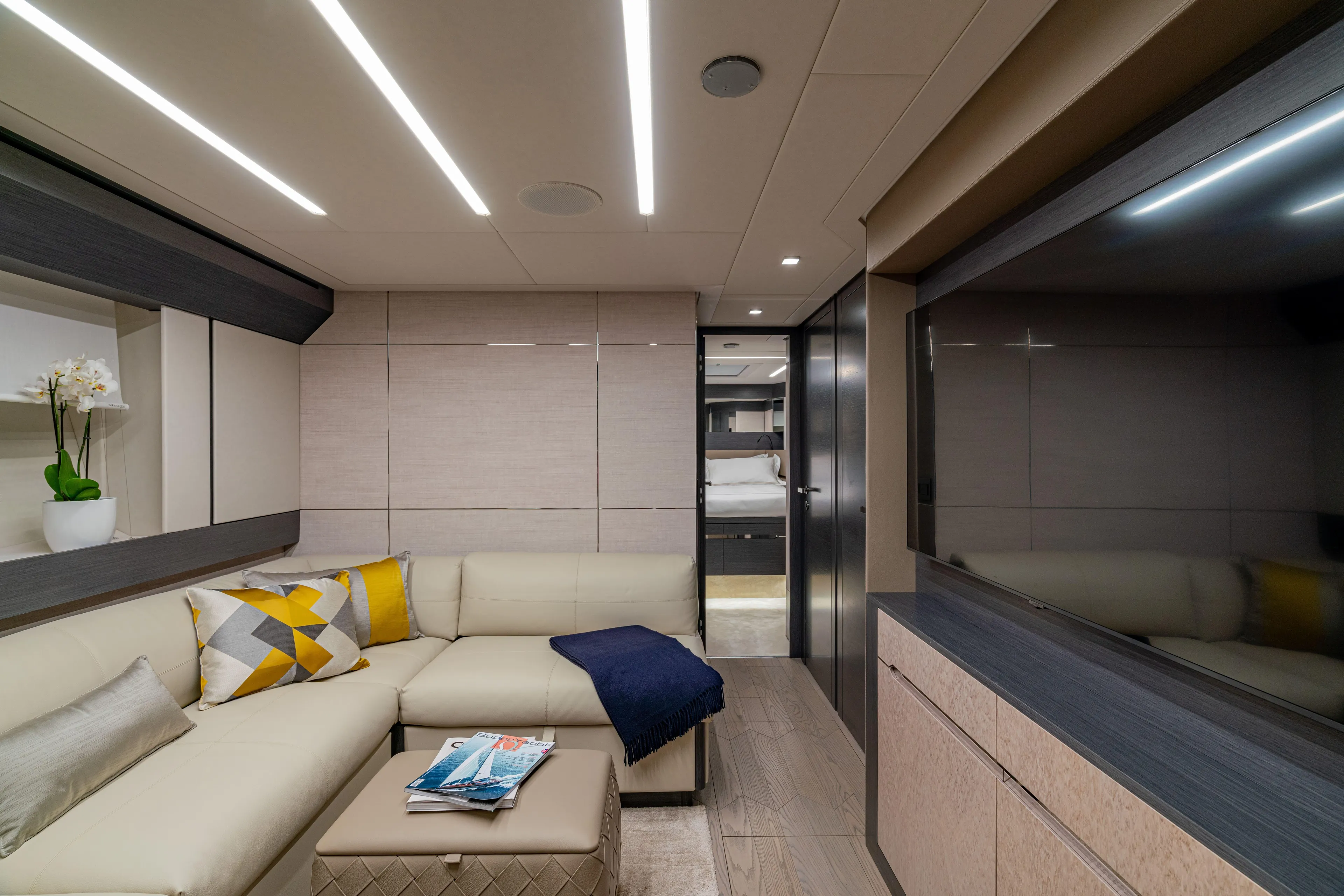 Silver Bullet Yacht Photos Pics Luxurious interior of 2022 Pershing 8X yacht with modern seating and decor.
