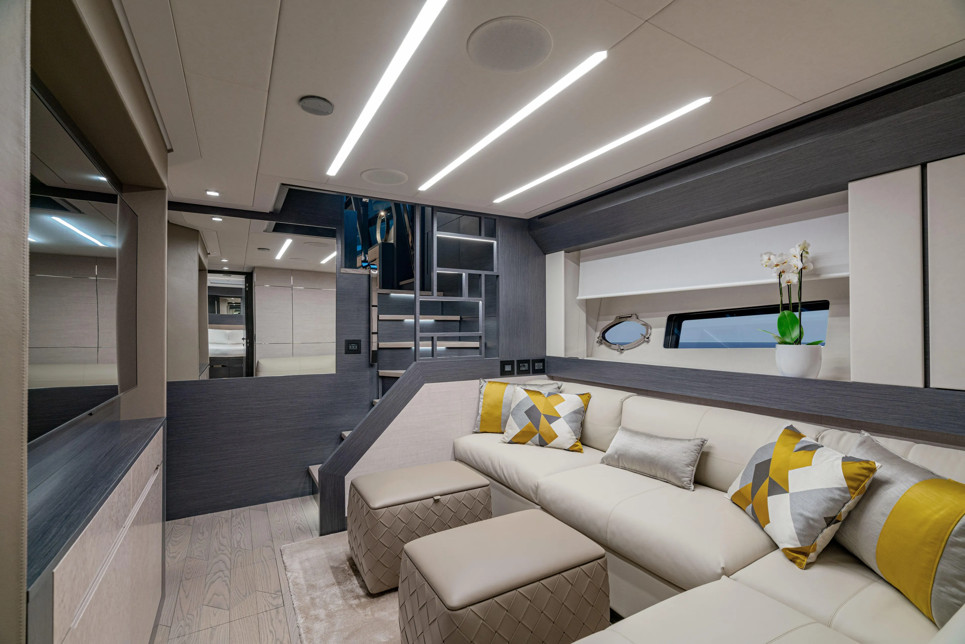 Silver Bullet Yacht Photos Pics Luxurious interior of 2022 Pershing 8X yacht with modern seating and elegant decor.
