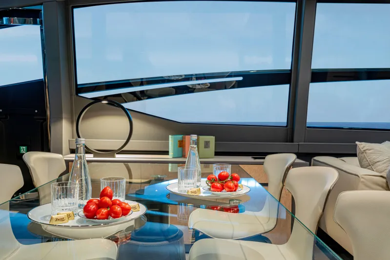 Silver Bullet Yacht Photos Pics Luxurious interior of 2022 Pershing 8X yacht with elegant dining setup.