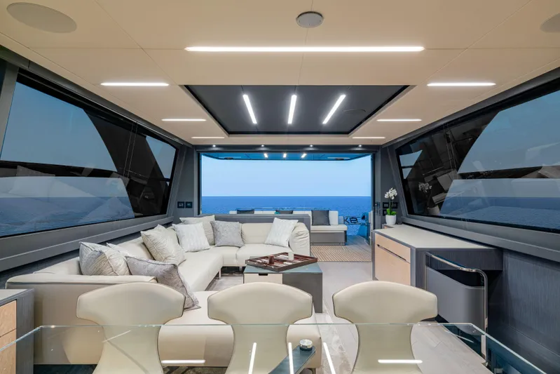 Silver Bullet Yacht Photos Pics Luxurious interior of 2022 Pershing 8X yacht with ocean view and modern furnishings.